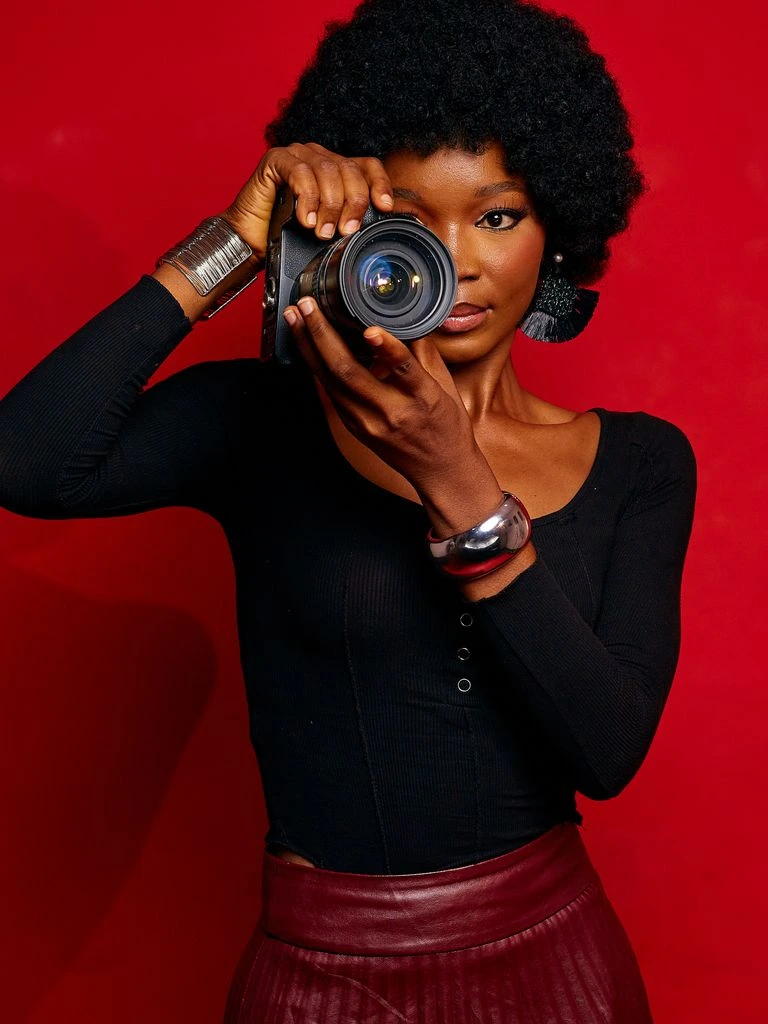 A keynote speaker takes the stage at Dominant Women Live